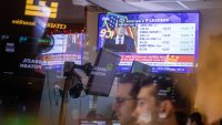 A television station on the floor of the New York Stock Exchange (NYSE) in New York, U.S., broadcasts U.S. Federal Reserve Chair Jerome Powell, on Wednesday, Dec. 18, 2024.