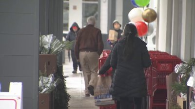 Last-minute shoppers make their final stops on Christmas Eve