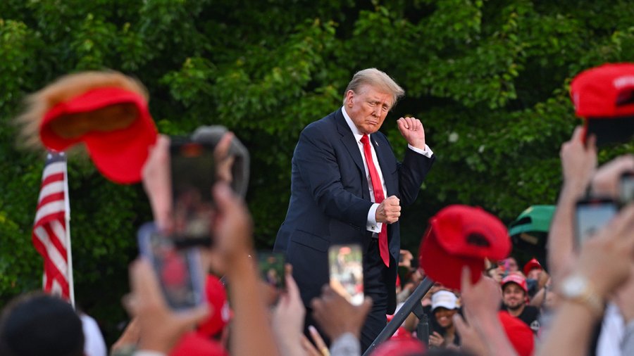 Donald Trump dances at a campaign rally at Crotona Park in New York City on May 23.