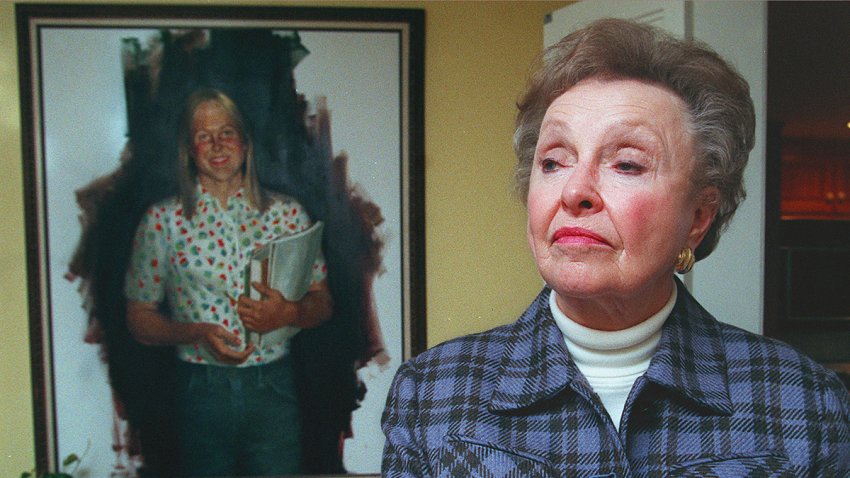 Dorthy Moxley stands by a portrait of her daughter Martha Moxley, at her home in Chatham, N.J., on Oct. 22, 1998.