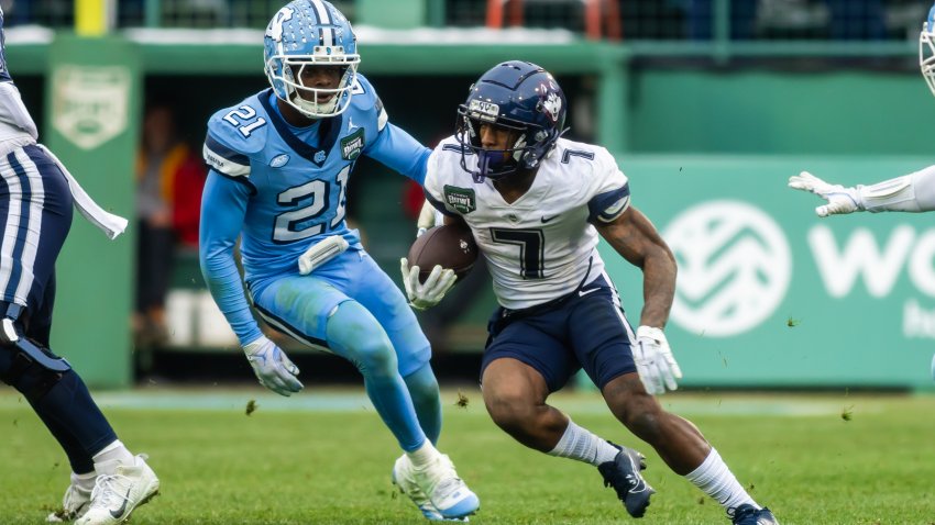 Mel Brown #7 of the Connecticut Huskies rushes during the fourth quarter of the 2024 Wasabi Fenway Bowl between The North Carolina Tar Heels and Connecticut Huskies at Fenway Park on December 28, 2024 in Boston, Massachusetts.