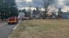 Two children, adult rescued after going through ice of backyard pond in Manchester