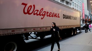 People make their way near a Walgreens pharmacy on March 09, 2023 in New York City. 