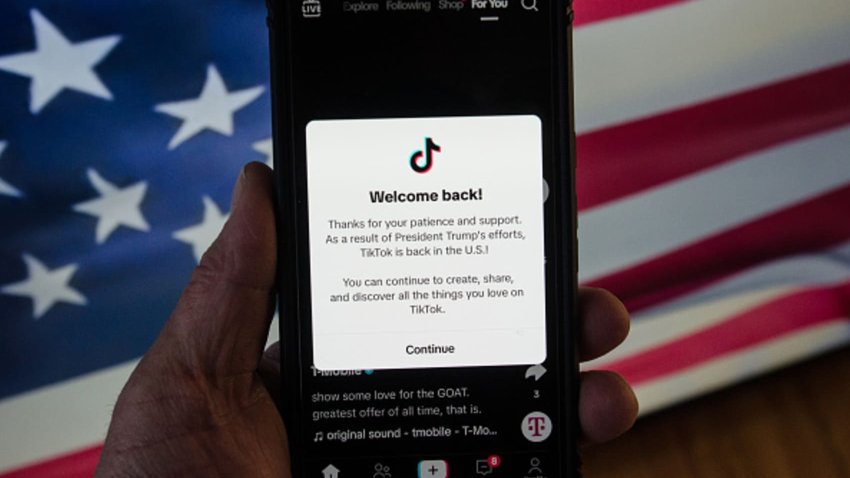 A smartphone displays the TikTok app after its reinstatement in the US, following President Trump’s efforts and the platform’s return to the US market on January 19, 2025 in Chicago, United States. 