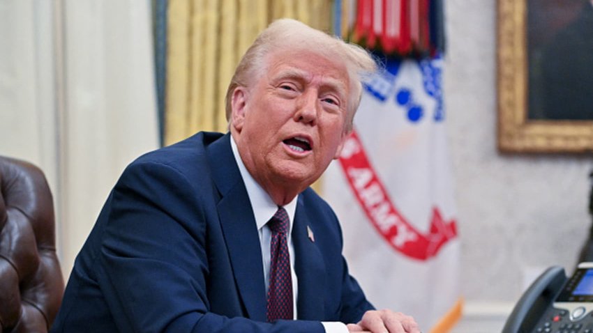 US President Donald Trump speaks to the media after signing executive orders in the Oval Office of the White House in Washington, DC, on Jan. 23, 2025.