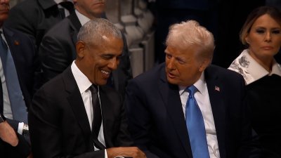 WATCH: Trump greets Pence, laughs with Obama at Jimmy Carter's funeral