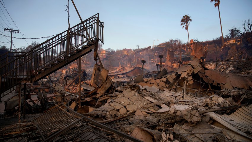 A staircase is left partially standing in a property in the aftermath of the Palisades Fire