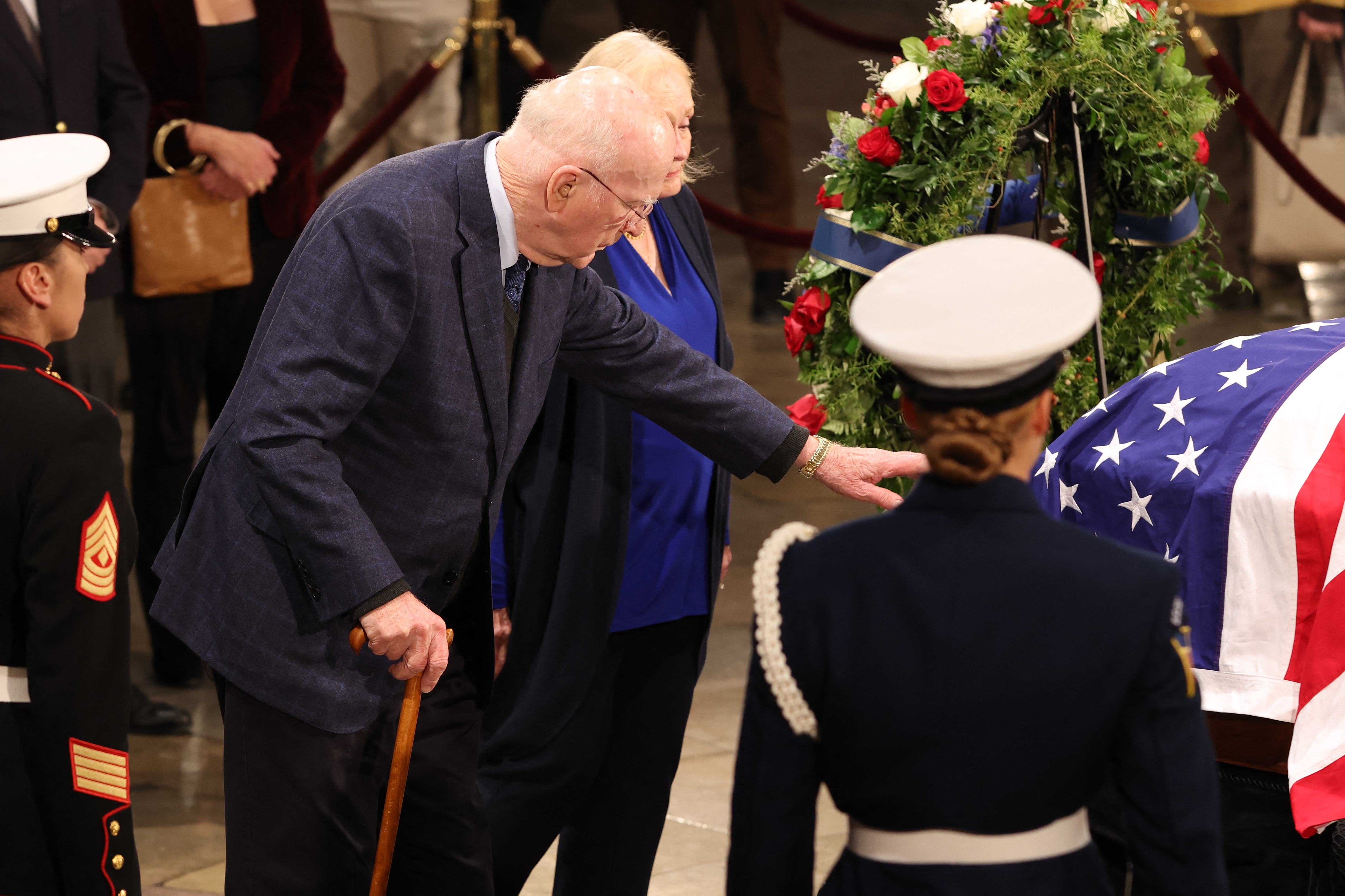 US Senator Patrick Leahy (C) and his wife Marcelle Pomerleau (C, rear) pay their respects as former US President Jimmy Carter lies in state in the US Capitol Rotunda on January 8, 2025, in Washington, DC.