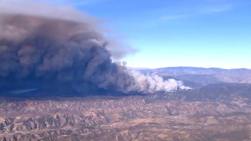 Firefighters responded to a brush fire Wednesday Jan. 22, 2025 north of Los Angeles on a day of red flag warnings for parts of Southern California.