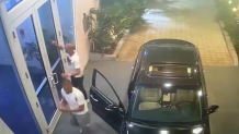 Surveillance video showed two men seeking help after a shooting in Miami Beach on Feb. 15, 2025.