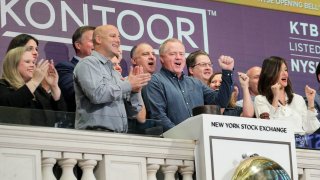 Scott Baxter, president and CEO of global apparel company Kontoor Brands, rings the opening bell at the New York Stock Exchange, June 5, 2019.