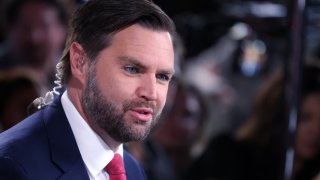 US Senator and Republican vice presidential candidate J.D. Vance speaks to a Fox News reporter in the spin room after participating in the Vice Presidential debate with Minnesota Governor and Democratic vice presidential candidate Tim Walz hosted by CBS News at the CBS Broadcast Center in New York on October 1, 2024.