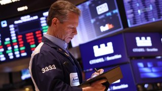 Traders work on the floor of the New York Stock Exchange during morning trading on Feb. 3, 2025 in New York City.
