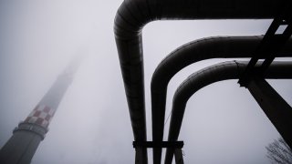 A chimney and pipes at the BKM Nonprofit Fotav Zrt power plant in Budapest, Hungary, on Thursday, Jan. 2, 2025.