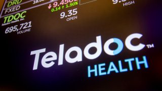Teladoc Health Inc. signage on the floor of the New York Stock Exchange (NYSE) in New York, US, on Tuesday, Dec. 31, 2024.