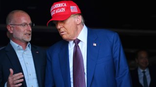 U.S. President-elect Donald Trump speaks to Brendan Carr, his intended pick for Chairman of the Federal Communications Commission, as he attends a viewing of the launch of the sixth test flight of the SpaceX Starship rocket on November 19, 2024 in Brownsville, Texas.