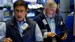 A trader works on the floor at the New York Stock Exchange on Feb. 24, 2025.