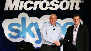 Microsoft CEO Steve Ballmer, left, shakes hands with Skype CEO Tony Bates during a news conference on May 10, 2011 in San Francisco, California. Microsoft has agreed to buy Skype for $8.5 billion.