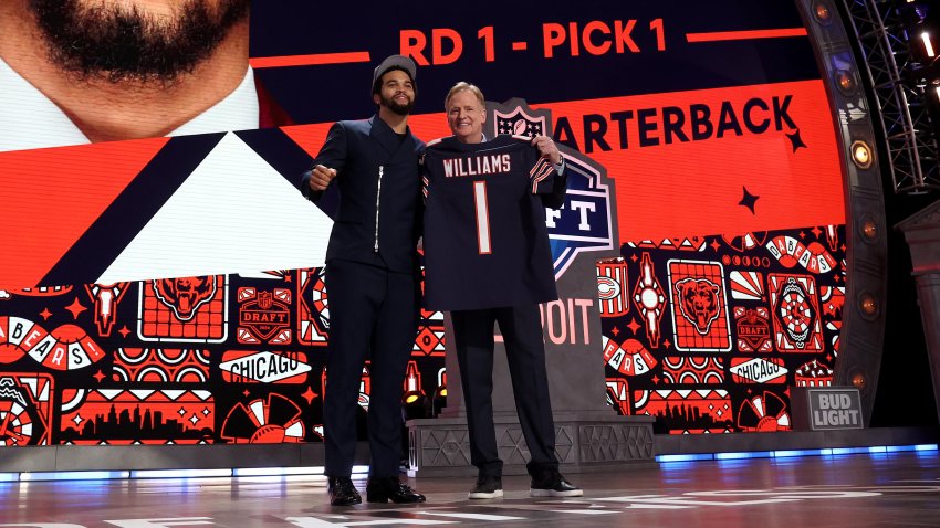 Caleb Williams poses with Roger Goodell at the 2024 NFL Draft