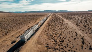 A generic image of a freight train in the desert