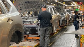 Autoworkers at Nissan’s Smyrna Vehicle Assembly Plant in Tennessee, June 6, 2022. The plant employs more than 7,000 people and produces a variety of vehicles, including the Leaf EV and Rogue crossover.