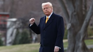 U.S. President Donald Trump gestures as he walks to board Marine One, while departing the White House en route to Florida, in Washington, D.C., U.S., March 7, 2025.