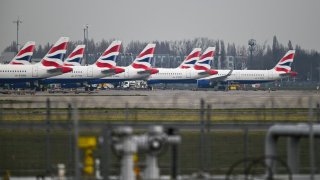 Passenger aircraft operated by British Airways on the tarmac at London Heathrow Airport in London, UK, on Friday, March 21, 2025.
