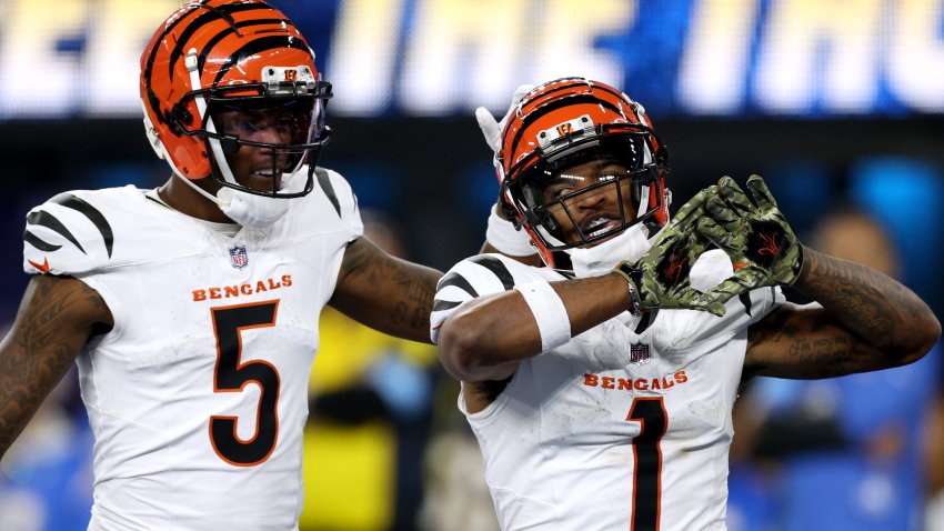Ja'Marr Chase #1 of the Cincinnati Bengals celebrates his touchdown with Tee Higgins #5
