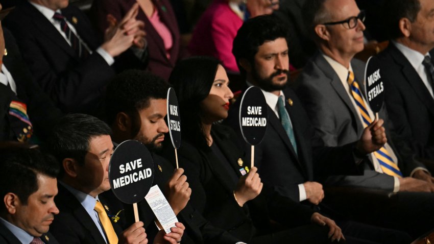 Democratic lawmakers protest as US President Donald Trump speaks during an address to a joint session of Congress at the US Capitol in Washington, DC, on March 4, 2025.