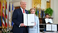 President Donald Trump holds an executive order alongside Secretary of Education Linda McMahon (R) in the East Room of the White house in Washington, D.C., March 20, 2025.