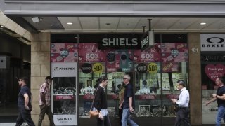Shoppers and pedestrians walk past a Shiels store at Rundle Mall in Adelaide, Australia, on Thursday, Feb. 11, 2021.