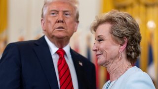 U.S. Secretary of Education Linda McMahon smiles during the signing event for an executive order to shut down the Department of Education next to U.S. President Donald Trump, in the East Room at the White House in Washington, D.C., U.S., March 20, 2025.