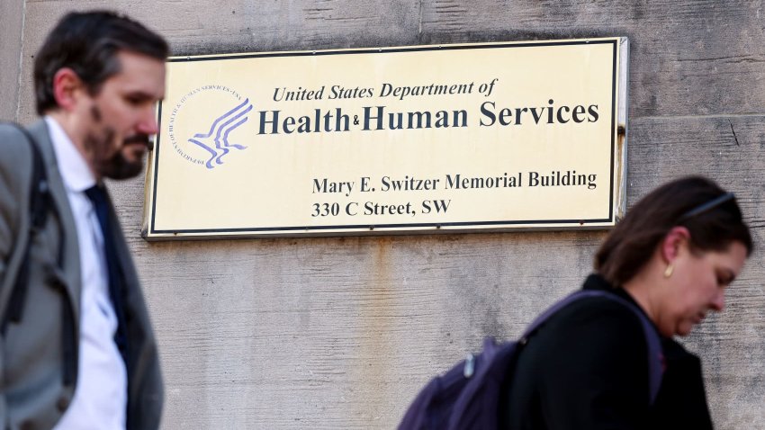 Employees of the Department of Health and Human Services (HHS) stand outside the Mary E. Switzer Memorial Building, after it was reported that the Trump administration fired staff at the Centers for Disease Control and Prevention and at the Food and Drug Administration, as it embarked on its plan to cut 10,000 jobs at HHS, in Washington, D.C., U.S., April 1, 2025. 