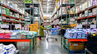People shop in Bayonne, New Jersey on April 8, 2025. 