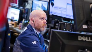 Traders work on the floor of the New York Stock Exchange on April 10, 2025. 