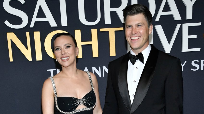 Scarlett Johansson, left, and Colin Jost