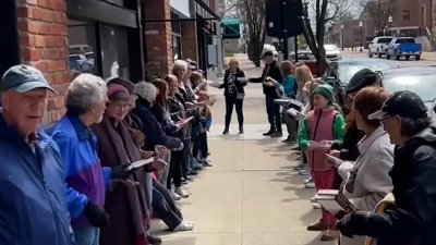 WATCH: Human chain helps Michigan bookstore move thousands of books