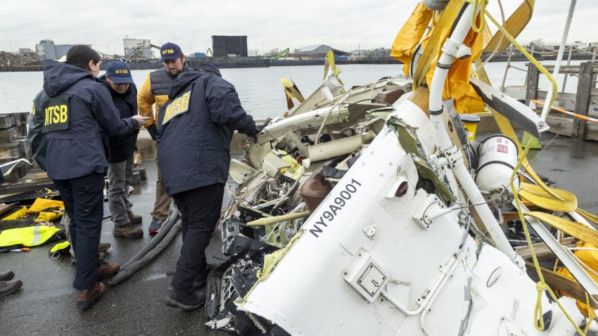 NTSB team surveying the wreckage recovered from the Bell 206 L-4 helicopter that crashed into Hudson River on April 10 near Jersey City, New Jersey.