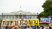 Demostrators rally near the White House during the nationwide "Hands Off!" protest