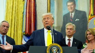 President Donald Trump speaks as Health and Human Services Secretary Robert F. Kennedy Jr., from left, Dr. Mehmet Oz and Oz's wife Lisa Oz listen during a swearing in ceremony for Mehmet Oz to be Administrator of the Centers for Medicare and Medicaid Services, in the Oval Office of the White House, Friday, April 18, 2025, in Washington.