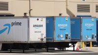 The Amazon Prime logo is displayed on Amazon delivery trucks in Richmond, California, June 21, 2023.