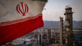 An Iranian national flag flies at the Persian Gulf Star Co. (PGSPC) gas condensate refinery in Bandar Abbas, Iran, on Jan. 9. 2019.