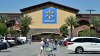 Walmart CFO says price hikes from tariffs could start later this month, as retailer beats on earnings