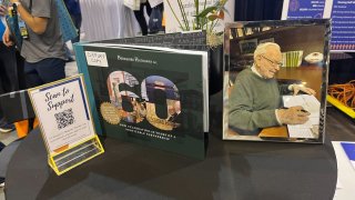 The Berkshire Hathaway 60th Anniversary book seen at the Berkshire Hathaway Annual Shareholders Meeting in Omaha, Nebraska on May 2, 2025.