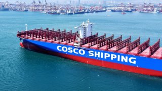 An empty container ship of COSCO Shipping sails to a container terminal in Qingdao in east China’s Shandong province Wednesday, April 16, 2025.