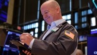 A trader works on the floor at the New York Stock Exchange (NYSE) in New York City, U.S., May 12, 2025.