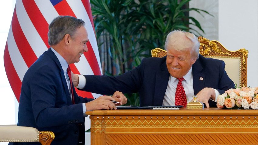 U.S. President Donald Trump and Boeing CEO Kelly Ortberg attend a signing ceremony with Qatar’s Emir Tamim bin Hamad Al Thani (not pictured), in Doha, Qatar, May 14, 2025.