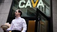 A customer exits a Cava restaurant in New York City on June 22, 2023.