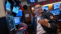 Traders work on the floor of the New York Stock Exchange (NYSE) on May 19, 2025 in New York City.