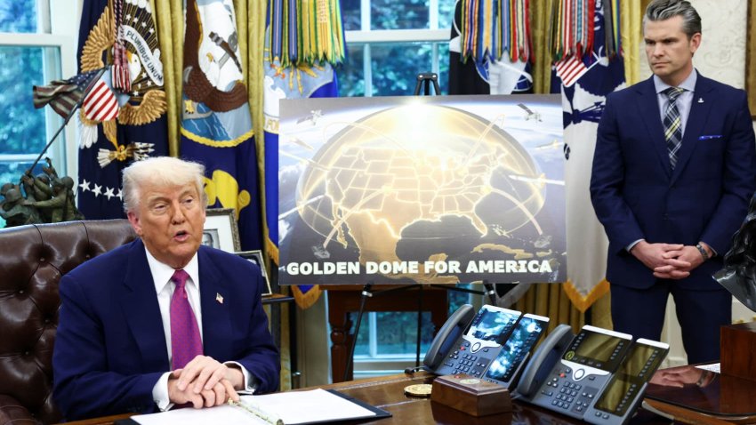 U.S. President Donald Trump makes an announcement regarding the Golden Dome missile defense shield next to U.S. Defense Secretary Pete Hegseth in the Oval Office of the White House in Washington, D.C., U.S., May 20, 2025.
